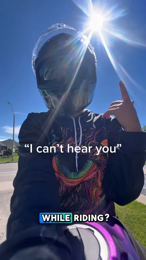 Motorcycle communication equipment introduced in a riding scenario.